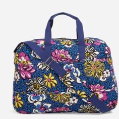 New With Tag Vera Bradley Grand Traveler Bag African Violet Print Carry-On Compliant The Grand Traveler Offers A Handy Trolley Sleeve, Two Slip Pockets On The Back And One Front Zippered Closure, Four Large Interior Slip Pockets, Rolled Handles And A Removable Shoulder Strap, And A Zip Closure. Carry-On Compliant Trolley Sleeve Option Lets You Slip It Onto A Rolling Luggage Piece--This Is Great For Travel! 1 Large Zipper Compartment On The Outside Two Exterior Slip Pockets On The Back Four Large African Violet Color, Carryon Bag, Vera Bradley Bag, African Violet, Violet Color, African Violets, Vera Bradley Bags, Perfect Bag, Carry On Bag