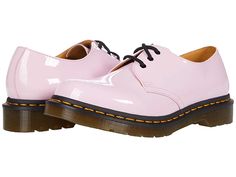 Dr. Martens 1461 Patent - Women's Boots : Pale Pink : The Dr. Martens 1461 Patent lace-up oxfords add a modern touch to this classic look by adding a glossy patent finish for a completely eye-catching update. Classic three-eye lace-up made from fine-grained leather that is coated for a high-shine, glossy finish. Goodyear® welt construction where the upper and sole are heat sealed and sewn together for excellent flexibility and durability. Smooth leather lining for a comfortable in-shoe feel. Lig Trendy Lace-up Patent Leather Oxfords, Spring Patent Leather Round Toe Oxfords, Spring Round Toe Patent Leather Oxfords, Trendy Patent Leather Oxfords For Formal Occasions, Classic Patent Leather Oxfords For Spring, Modern Patent Leather Lace-up Oxfords, Dr Martens Style, Martens Style, Stella Mccartney Elyse