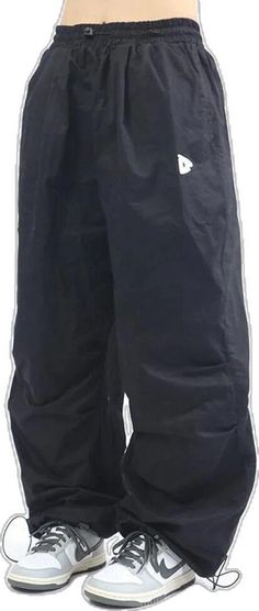 Casual Black Harem Pants With Cargo Pockets, Baggy Wide-leg Leisure Bottoms, Sporty Wide Leg Relaxed Fit Harem Pants, Sporty Relaxed Fit Wide Leg Harem Pants, Wide Leg Stretch Harem Pants For Leisure, Casual Wide Leg Bottoms For Outdoor, Stretch Wide Leg Harem Pants For Leisure, Stretch Wide-leg Parachute Pants For Streetwear, Casual High Waist Harem Pants For Streetwear