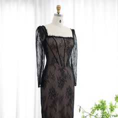 Experience elegance and grace with our Elegant Black Lace Long Sleeves Sheath Evening Dress SF038. The intricate lace and long sleeves add a touch of sophistication to any evening event. Made with quality material, this dress ensures a comfortable and stylish fit. Be the center of attention with this timeless piece. window.adminAccountId=244214477; Fitted Black Dress With Delicate Lace, Fitted Lace Dress With Square Neck For Evening, Fitted Lace Dress With Patchwork For Gala, Elegant Fitted Evening Dress With Delicate Lace, Fitted Lace Long Sleeve Evening Dress, Elegant Long Sleeve Lace Dress For Gala, Formal Lace Dress With Sheer Sleeves, Long Sleeve Lace Dress For Gala, Long Sleeve Lace Trim Gala Dress