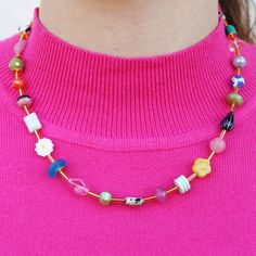 The Mariposa Beaded Necklace is fun personified. This multicolored, beaded necklace is sure to make you smile. This necklace is handmade using an assortment of beads including Czech glass and gemstone beads on a single strand of colorful loveliness! While each bead might have a different color, consistency, pattern, texture and shape, they are all separated by a cylindrical golden bead. This allows for you to really be able to see the unique beauty of the necklace and still have unity in the design. We are beyond obsessed with this fun look! It is versatile for a variety of looks. Happy styling! Multi-color Single strand Contains assorted Czech glass, gemstones, glass beads 18 inches long, 16 inch necklace plus a 2 inch extender Gold plated over brass chain and clasp Lobster clasp Nickel a Whimsical Jewelry, 16 Inch Necklace, Pattern Texture, Unique Beauty, Brass Chain, You Smile, Czech Glass, Make You Smile, Lobster Clasp