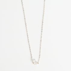 Our Herkimer Diamond Choker is a subtle accessory that combines the timeless elegance of 14kt gold fill or sterling silver with the natural beauty of Herkimer diamonds. Each choker is carefully handcrafted, and has a simple, elegant design of a single Herkimer diamond suspended on a gorgeous chain. It is a minimalist design that accentuates the beauty of the stone. These diamonds are sourced from the Herkimer County region of upstate New York, known for their exceptional clarity and radiance. Th Dainty White Gold Pearl Necklace For Formal Occasions, Formal Dainty White Gold Pearl Necklace, Dainty Diamond Necklace With Pearl Pendant, Dainty Diamond Jewelry With Pearl Pendant, Dainty White Gold Pearl Necklace For Anniversary, Minimalist Sterling Silver Pearl Necklace For Formal Occasions, Classic Sterling Silver Pearl Necklace For Everyday, Elegant Sterling Silver Birthstone Necklace With Adjustable Chain, Delicate 14k White Gold Pearl Necklace