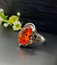 Baltic Amber ring in sterling silver Sterling Silver 925 Baltic Amber, Size 7 3/4 Face of the ring: Height - 22mm, width -18mm Please note: Colors may vary slightly due to monitor display settings. Items in the photograph are not actual size. Closeup photos are taken. Please read the measurements. Thank you for visiting! PLEASE VISIT MY OTHER SHOP FOR UNIQUE HANDCRAFTED ARTISAN JEWELRY https://www.etsy.com/shop/AlenaZenaJewelry Sterling Silver Amber Ring, Handmade Amber Sterling Silver Rings, Amber Antique Sterling Silver Jewelry, Unique Amber Sterling Silver Jewelry, Antique Amber-colored Sterling Silver Jewelry, Amber Ring, Handcrafted Artisan Jewelry, Baltic Amber, Ring Size 7