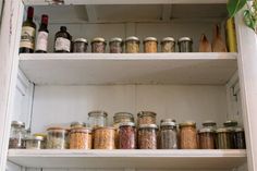 an open pantry filled with lots of different types of spices