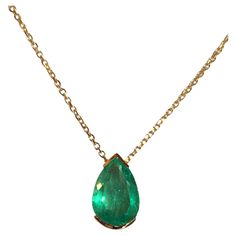 Natural Fine Colombian Emerald Pear Drop Pendant, crafted in an 18 Karat Gold bezel setting – designed to show the spectacular brilliance and beautiful medium green color and excellent transparency of this magnificent gemstone. - Natural Colombian Emerald 3.00 Carats. - Set in 18 Karat Gold. - Length 15.00mm Width 8.00 mm Depth 5.79 mm. - Suspended on 18 Karat Gold chain, 18 inches in length. Exquisite Pear-shaped Emerald Necklace For Formal Occasions, Luxury Pear-shaped Emerald Gemstone Necklace, Luxury Teardrop Emerald Necklace With 17 Jewels, Pear-shaped Emerald Gemstone Necklace For Formal Events, Pear-shaped Emerald Gemstone Necklace For Formal Occasions, Briolette Emerald Necklace For Formal Occasions, Formal Emerald Briolette Necklace, Formal Briolette Emerald Necklace, Formal Pear-shaped Emerald Necklace In Fine Jewelry Style