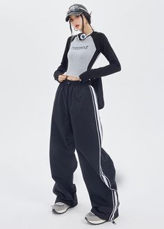 Applicable age: 18-24 years old Size: XS S M L XL style: street Street: Athleisure Women's trousers waist height: natural waist color: black Item number: K4442E23 Season of the Year: Fall 2022 Thickness: Regular Length: trousers Women's pants type: straight pants Material composition: cotton Athleisure Wide-leg Sweatpants For Streetwear, Sporty Full Length Spring Joggers, Sporty Full-length Spring Joggers, Sporty Full-length Bottoms For Winter, Winter Sportswear Bottoms For Streetwear, Black High Waist Sportswear Bottoms, High Waist Black Sportswear Bottoms, Black Sportswear Bottoms For Gym, Trendy Wide Leg Sweatpants For Sports