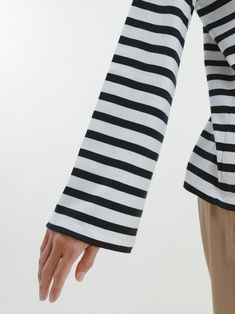 If you’re looking for the perfect French girl striped shirt with a twist, this is it. What sets it apart is the drop shoulder, slight bell sleeve, and sleek, flattering neckline. It’s a classic you’ll reach for in your closet, a reminder that you are a steady presence in this world. Lounge Party, Girls Stripes, French Girl, Fall Collections, Travel Gifts, Navy White, This World, Bell Sleeve, Striped Shirt