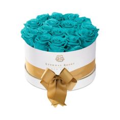 a white box with blue roses in it