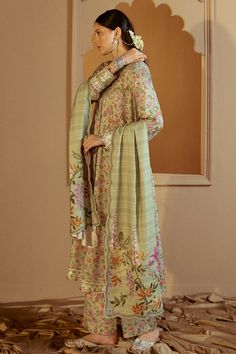 Product Details SHIRTPrinted shirt (Marina)40" embroidered patti for shirt hem40" embroidered patti for sleevesTROUSERMarina printed trouser DUPATTAMarina printed shawlATTRIBUTEThis 3-piece set includes a SAGE BLOOM shirt with an elegant marina print, featuring embroidered patti detailing on the shirt hem and sleeves. The matching trouser and dupatta also feature the marina print, creating a cohesive and stylish look. Printed Suit, Printed Trousers, Photographic Lighting, Fabric Stores Online, Extra Fabric, Jacquard Fabric, Product Label, Designer Suits, Fabric Store