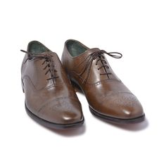 If you’ve been thinking which lace shoes to invest in, then look no further. These brown oxford capped toe brogue genuine leather shoes are more splendid than you ever imagined! The vamp covers the instep and toes, whereas the quarter wraps around the heel and joins the vamp in the middle of the foot. When it comes to versatility, elegance, and quality, you can never go wrong with these brown oxford capped toe brogue genuine leather shoes. Following are their features; Made of high-quality leather Capped toe with brogue design Oxford style handmade When it comes to style and quality, we guarantee you a great blend of both with this winning pair. Brown Lace-up Brogue Shoes With Cap Toe, Wingtip Leather Oxford Shoes With Laces, Brown Cap Toe Goodyear Welted Lace-up Shoes, Brown Goodyear Welted Cap Toe Lace-up Shoes, Oxford Leather Wingtip Shoes With Laces, Brown Cap Toe Lace-up Shoes With Goodyear Welt, Leather Oxford Shoes With Brogue Detailing, Brown Wingtip Oxfords With Laces, Goodyear Welted Almond Toe Oxfords