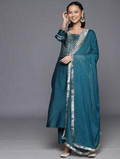 Blue Silk Blend Ethnic Motif Embroidered Suit Set with Silk Chiffon Dupatta Navratri Festive Palazzo Set With Embroidered Border, Designer Palazzo Set With Embroidered Border, Designer Sharara With Straight Kurta And Embroidered Border, Straight Kurta With Sheer Dupatta In Art Silk, Art Silk Kurta With Sheer Dupatta, Festive Designer Palazzo Set With Embroidered Border, Navratri Palazzo Set With Embroidered Border And Straight Kurta, Navratri Straight Kurta Palazzo Set With Embroidered Border, Festive Art Silk Palazzo Set With Embroidered Border