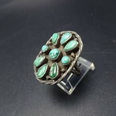 "VINTAGE NAVAJO RING DESCRIPTION: This exquisite old ring will be a treasured addition to your collection of fine vintage Native American jewelry. MEASUREMENTS: Ring face measures 1\" x 3/4\" RING SIZE: 7 WEIGHT: 7.0 grams SIGNED: no STERLING: unmarked, verified sterling silver" Untreated Southwestern Style Ring Jewelry, Vintage Open Ring With Cabochon, Vintage Green Turquoise Ring, Vintage Handmade Ring Jewelry, Handmade Vintage Ring Jewelry, Vintage Green Turquoise Cabochon Ring, Handmade Vintage Style Ring, Southwestern Style Cabochon Rings, Collectible, Southwestern Style Cabochon Ring Collectible