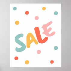 a poster with the word sale written in multicolored polka dots on white paper