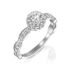 A stunning center diamond is encompassed by an elegant halo of 12 tiny white diamonds. If that isn’t enough sparkle, the unique curved pattern band is encrusted with diamonds as well. This hybrid of the past and present, with modern and vintage features, is a must-have piece. All features can be customized! Please contact us if you wish to make changes, we love making custom designs. All of our jewelry is carefully handmade in our atelier. *HC diamond are all conflict-free diamonds To order by p Timeless Halo Cluster Ring For Anniversary, Timeless Anniversary Cluster Ring With Halo, 14k White Gold Halo Diamond Ring, Timeless Rings With Halo Setting, Diamond Cluster Ring With Halo And Round Band, Promise Halo Diamond Ring Round Cut, Dazzling Halo Setting Rings For Anniversary, Dazzling Anniversary Rings With Halo Setting, Promise Diamond Halo Ring With Round Cut