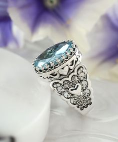 Ladies, from casual dates to fancy parties and weddings, our 925 Sterling Silver Filigree Art Cocktail Ring is an ideal gift choice for women who loves jewelry. Whether you're a gem lover or a wearer of handcrafted jewelry, this ring will surely delight you with its designer's artistry and craftsmanship. We have carefully handpicked various stones that are used in making this ring so that it reflects both your taste as well as personality. This ring features Amethyst, Blue Topaz, Carnelian, Ruby Luxury Filigree Topaz Ring For Formal Occasions, Silver Heart Cut Topaz Ring Gift, Heart Cut Silver Topaz Ring For Gift, Blue Elegant Heart Ring For Gift, Elegant Blue Heart Ring For Gift, Filigree Topaz Ring Gift, Gift Topaz Ring With Intricate Design, Ruby Quartz, Gorgeous Style