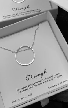 Handmade by Artisan, Danielle Nicole Enright, this unique necklace features a circular pendant with chain running through the middle. Strung on 15” sterling silver Rolo chain with a 2” extender. ABRAU brand tag attached. Lobster clasp closure. Minimalist style, filled with symbolism. Wear alone or layered with other necklaces. Everyday Adjustable Circular Necklaces, Adjustable Circle Necklaces For Everyday, Everyday Round Silver Chain Jewelry, Sterling Silver Clavicle Chain Necklace Gift, Minimalist Oval Pendant Necklace As Gift For Her, Minimalist Sterling Silver Open Circle Necklace, Modern Necklace With Large Pendant As Gift, Sterling Silver Coin Pendant Jewelry, Silver Circular Minimalist Chain Necklace