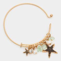 Gold Metal Charm Bangle Bracelet Statement Fashion Jewelry Accessories Size : 1.25" H, 2.25" D Dangling Charms Theme: Starfish Starfish M 2037 B Trendy Adjustable Jewelry With Starfish Charm, Trendy Adjustable Starfish Charm Jewelry, Beach Metal Jewelry With Starfish Charm, Metal Starfish Jewelry, Adjustable Ocean-inspired Metal Jewelry, Adjustable Starfish Charm Jewelry, Adjustable Starfish Bracelet With Lobster Clasp, Metal Starfish Charm Jewelry, Gold Starfish Bracelet With Starfish Charm