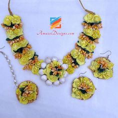 Yellow Flower Necklace Earrings Tikka Set - And Kadas With Attached Rings - Made of Fabric and Paper Available to shop online and delivered to your doorsteps anywhere in the world with our Everything-Everywhere FREE Shipping. 📦Unmatched FREE Worldwide Shipping EXPLORE more Indian Earrings and Jhumki Earrings. Maang Tikka Sets and Tikka Set Punjabi Match with our pretty Single Line Necklaces Rajveer, Canada ⭐️⭐️⭐️⭐️⭐️ I bought chokkar set from this website. I really loved the set and couldn’t ex Yellow Earrings With Flower Decoration, Yellow Trendy Flower Earrings For Party, Yellow Flower Jewelry With Matching Earrings, Yellow Flower Earrings For Party, Haldi Jewellery Bridal Flowers Yellow And Pink, Maang Tikka Set, Yellow Flower Necklace, Maang Tikka, Jhumki Earrings