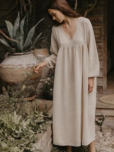 One of our personal favorites, this is truly the most perfect and flattering style for all shapes and sizes. Featuring a deep V-neck, empire waist, billowing sleeves, and a full-flowing skirt, The Meadow Dress is breezy and effortless, just like a wildflower meadow. We adore how it looks with The Woven Mule. For reference, Rossella in our first featured image is 5’3 and is wearing The Meadow Dress in size S (US 4-6). It’s designed to be worn loose and flowy, so we recommend sizing down if you pr Fae Dress, Meadow Dress, The Simple Folk, Loose Clothes, Muslin Dress, Earth Mama, Wildflower Meadow, Butterfly Fairy, Gauze Dress