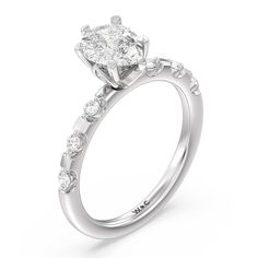 a diamond engagement ring on a white background