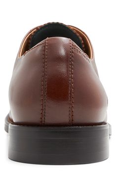 Handsome, polished and easy to wear, this wardrobe-staple leather oxford sports minimal detailing to give it maximum versatility across your formal wardrobe. Lace-up style Memory foam cushioning Leather upper/leather and textile lining/rubber sole Imported Modern Leather Dress Shoes For Semi-formal Occasions, Modern Leather Oxfords With Leather Lining, Semi-formal Leather Oxfords With Leather Footbed, Modern Leather Oxfords With Brogue Detailing, Business Oxfords With Calf Leather And Leather Footbed, Classic Cognac Oxfords For Business, Cognac Leather-lined Oxfords For Business, Timeless Cognac Oxfords For Business, Business Cognac Oxfords With Goodyear Welt