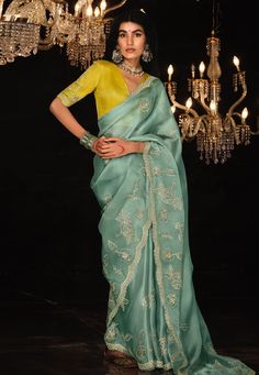 Sea green organza saree with blouse 5333  Desc:  Color : Sea Green Fabric : Organza Work : Embroidery Wash Care : Dry clean Sleeve Style : Half Sleeve Long Sleeves : Done only in Custom Stitch Sleeves Lining : Done only in Custom Stitch Bust Size : 32 to 42 Inches Occasion : Festival   Diwali   Mehendi   Ceremonial   Vat Purnima   Raksha Bandhan   Karwa Chauth   Ugadi. With Express Free Shipping and Custom Stitching, Buy Designer Sarees - Indian Party wedding and bridal  Sea green organza saree with blouse 5333 online in USA, UK and Canada from KollyBollyEthnics.com Anarkali Ideas, Garara Suit, Saree Bridesmaid, Bridal Wear Indian, Blue Sari, Bridal Sarees Online, Half And Half Saree, Indian Wedding Sarees, Partywear Sarees