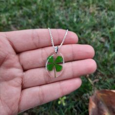 Pendant made of real four leaf clover is one of my most popular handicrafts. it also can be a good gift for St. Patrick's Day I made a video so that you can see this pendant from different angles.  Traditionally, four-leaf clovers bring good luck to find them. It is believed that each leaf represents something: the first for faith, the second for hope, the third for love, and the fourth for luck. Due to the fact that all clovers are real, they may differ slightly from each other Green Leaf-shaped Jewelry Gift, Unique Leaf-shaped Necklace For Gifts, Leaf-shaped Pressed Flowers Jewelry Gift, Leaf Shaped Pressed Flowers Jewelry Gift, Green Leaf-shaped Necklace For Gift, Handmade Leaf-shaped Necklace Gift, Handmade Leaf-shaped Necklace For Gifts, Handmade Leaf Shaped Necklace For Gift, Handmade Leaf Necklace For Gift