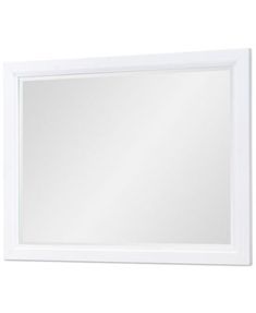 a white framed mirror on a wall