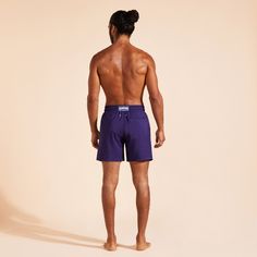 Choose a lightweight style with the Mahina men's swimsuit in plain eco-friendly material. Its fabric made from recycled plastic bottles is both responsible and ultra-lightweight. These classic men swim trunks with an elasticated waistband can be folded up into the back pocket for easy storage and transport.Ultra-light fabric packable men swimwear into the zipped back pocket to become a pouch with a Vilebrequin rubber labelElastic waistband with drawstring and Zamac tips engraved VilebrequinMen swim trunks with two side pocketsMen swim trunks with two back eyeletsSide leg length in M: 15.5"Men swimwearSolid men swimwear100% Recycled polyester To take care of your adored en swim trunks, we advise you to follow our suggestions below:Washing your men swim trunks at 86FNo bleachingNo tumble dry Men’s Swimsuit, Father And Son Clothing, Men Swim Shorts, Men Swimwear, Men's Swimwear, Mens Swim Shorts, Boys Swimwear, Swim Brief, Swimming Costume