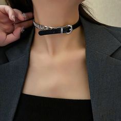 This unique necklace combines the edgy elegance of a chain with the classic appeal of a belt. Crafted from leather and metal, it doubles as a chic bracelet, adding a versatile accessory to any outfit. Perfect for those seeking a statement piece that's both chic and unique. Chain length 41cm (16inch) Half belted half chain design Can also be used as a bracelet Faux leather, metal Trendy Silver Choker Fashion Accessory, Chic Black Chain Link Belt, Elegant Chain Link Choker For Party, Trendy Metal Choker, Trendy Silver Chain Choker For Party, Trendy Silver Formal Choker, Trendy Metal Chain Choker, Chic Metal Chain Choker, Trendy Silver Choker For Formal Occasions