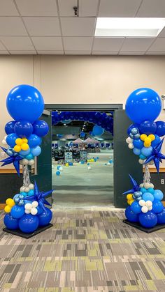 balloons and streamers decorate the entrance to an office building