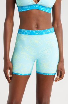 A reversible design doubles your styling opportunities in these effortless swim shorts made with built-in sun protection and a stretchy, stay-put fit. Elastic waist UPF 50+ sun protection 80% recycled polyester, 20% spandex Machine wash, tumble dry Imported Athleisure Swim Trunks With Built-in Shorts For Surfing, Warm Weather Swimwear With Built-in Shorts, Sporty Swimwear With Built-in Shorts For Warm Weather, Green Stretch Surfing Shorts, Stretch Short Swimwear For Surfing, Surfing Swim Trunks With Built-in Shorts, Summer Compression Athleisure Shorts, Summer Compression Shorts For Athleisure, Compression Shorts For Summer Athleisure