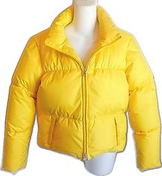 Yellow Spring Puffer Jacket, Yellow Winter Outerwear For Cold Weather, Fitted Yellow Outerwear For Outdoors, Yellow Puffer Jacket For Winter, Yellow Casual Spring Puffer Jacket, Yellow Casual Puffer Jacket For Spring, Casual Yellow Puffer Jacket For Spring, Casual Yellow Spring Puffer Jacket, Trendy Mustard Outerwear For Spring