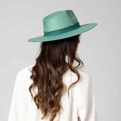 Discover sophistication and elegance with our Women's Faux Felt Fedora. Featuring captivating colors of teal, pink, and white, this iconic fedora is made with 100% polyester. With a brim size of 3.75", it offers optimal sun protection and comes in a flattering one size of 57cm. This Faux felt fedora features a tonal frayed cotton band detail. Embrace luxury and style with our stunning UPF 50 fedora, perfect for any occasion. Features: Color: Teal, Pink, WhiteMaterial: 100% PolyesterBrim Size: 3. Turquoise Fedora Hat For Spring, Turquoise Fedora For Spring, Green Short Brim Felt Hat For Kentucky Derby, Green Hat Bands For Kentucky Derby, Spring Fedora With Flat Brim, Spring Fedora With Flat Crown, Adjustable Turquoise Hat For Spring, Green Fedora With Curved Brim For Spring, Adjustable Green Fedora For Spring