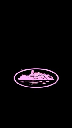 a pink and black photo of a ship in the dark with an oval frame around it