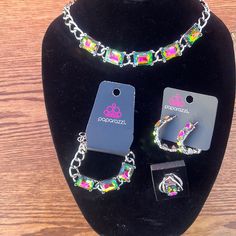 Complete Jewel Tone Paparazzi Set. Complete With Necklace, Earrings, Bracelet And Ring. Your Complete Look. Enter 109 In The Comments If You Wish To Order. Sterling Silver Bracelet Jewelry For Party, Multicolor Metal Jewelry As A Gift, Multicolor Metal Jewelry For Gifts, Multicolor Metal Jewelry As Gift, Multicolor Metal Jewelry Gift, Trendy Nickel Free Jewelry For Parties, Multicolor Metal Jewelry For Party, Multicolor Metal Party Jewelry, Party Costume Jewelry With Jewels