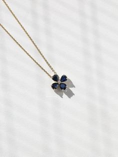 Kobelli Four Petal Sapphire & Diamond Flower Pendant and Chain Fine Jewelry Pear-shaped Sapphire, Elegant Sapphire Flower-shaped Jewelry, Fine Jewelry Sapphire Teardrop Necklace, Fine Jewelry Sapphire Flower, Sapphire Flower Jewelry In Fine Style, Sapphire Pear-shaped Gemstone Necklace, Pear Shaped Sapphire Necklace As Gift, Pear Shaped Sapphire Necklace For Gift, Pear-shaped Sapphire Necklace Gift