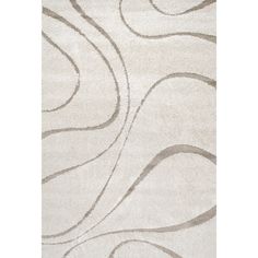 a white rug with swirls on it