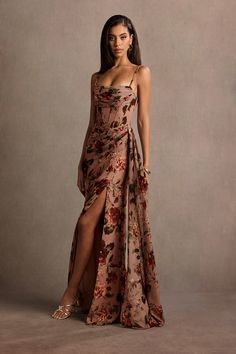 Exude confidence in our Aurra Maxi Dress. This floral chiffon style features a pleated neckline, paired with exposed boning at the waist and a draped floor-length skirt. This is the perfect go-to dress for your next formal event. Fig Bridesmaid Dresses, Asian Wedding Guest Dress, Victorian Wedding Guest Dress, Ethiopian Wedding Guest Attire, Florence Wedding Guest Dress, Romantic Evening Dress, Eucalyptus Wedding Guest Dress, High Low Evening Dresses Elegant, Beach Formal Wedding Guest Plus Size