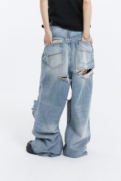 Embrace your unique style with our Distressed Ripped Knee Wide-Leg Denim Jeans, the epitome of laid-back chic.
Expertly crafted from soft, high-quality denim, these jeans feature a relaxed wide-leg fit and artfully placed distressed knee rip details for an authentically worn look. The washed denim blue hue and thoughtful distressing convey an air of effortless sophistication, while providing comfort and durability for your everyday adventures.
Mix and match with your favorite tees or dress them Distressed Cutoff Flare Jeans, Distressed Denim Cutoff Flare Jeans, Distressed Denim Flare Jeans With Cutoff, Edgy Light Wash Denim Jeans, Urban Denim Blue Distressed Flare Jeans, Urban Style Distressed Denim Blue Flare Jeans, Urban Distressed Denim Blue Flare Jeans, Washed Blue Ripped Rigid Denim Bottoms, Ripped Medium Wash Rigid Denim Jeans