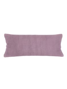 a purple pillow on a white background