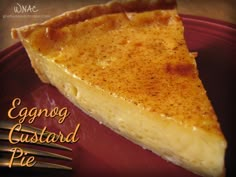 a piece of eggnog custard pie on a red plate with a fork