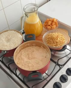 the food is prepared and ready to be cooked on the stove top in the kitchen