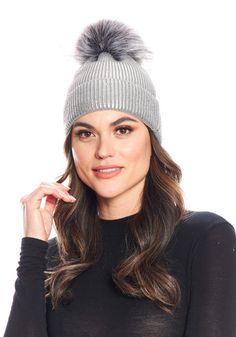 Crazy-cute and wearable, the Metallic Pom Hat is so cool, you'll wear it before the leaves fall. Why not--in Metallic Silver knit, it's stretchy and comfy. Better still, this substantial knit has recovery as well. Easy to pull on, the cap, when cuffed, measures 8" from the fur pom to the cuff fold. Ahhh, but the pièce de résistance is the oversize Grey Fox pom with Silver tipping. The magic of mixing Metallic knit with fur bestows a broad license to wear the Metallic Pom Hat with anything, every Super Soft Fall Beanie Hat, Women's Ponchos & Wraps, Kids Vest, Grey Fox, Fabulous Furs, Ladies Poncho, Metallic Knit, Leaves Fall, Kids Coats