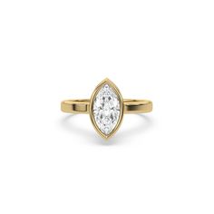 Marquise Diamond Hidden Halo Engagement Ring is made with a marquise cut diamond set in a bezel setting with a hidden-halo of round diamonds all set in a pave setting on a solid gold band. Details: - Made to Order- Focal Diamond Weight: 0.25 CT, 0.50 CT, 0.75 CT, 1.00 CT- Accent Diamond Weight: 0.07 CT - 0.28 CT (Carat weight varies based on chosen Focal Diamond) - Focal Diamond Cut: Marquise- Accent Diamond Cut: Round- Diamond Type: Lab Grown Diamond (CVD, HPHT)- Diamond Clarity: VS - Diamond C White Gold Marquise Diamond Ring With Bezel Setting, Diamond Marquise Ring With Bezel Setting, Fine Jewelry Marquise Cut Ring With Bezel Setting, Marquise Diamond Ring With Bezel Setting, Yellow Gold Marquise Cut Diamond Ring With Bezel Setting, Modern Marquise Cut Diamond Ring With Bezel Setting, Modern Marquise-cut Diamond Ring With Bezel Setting, Yellow Gold Diamond Ring With Bezel Setting, Marquise Cut, Formal Marquise Diamond Ring With Bezel Setting