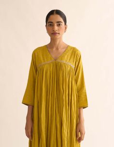 Editor's Note The bright lemon green kediyu kurta features a traditional design with a contemporary twist. The embellished yoke adds a touch of sparkle and elegance to the outfit. Paired with straight pants, this ensemble creates a cohesive and stylish look. Fabric: Cotton Color: Lemon green Components: Kurta and pants Occasion: Casual Disclaimer: Product color may slightly vary due to photographic lighting sources or your monitor setting. Care: Dry clean only About the Designer DOT is a unique Kurta And Pants, Blouse Yoke, Personal Shopping Service, Straight Pants, Photographic Lighting, Personal Shopping, Sophisticated Style, Traditional Design, Fabric Cotton