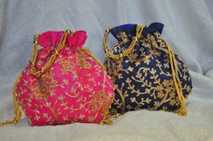 Ready to ship from USA! The list price is for ONE embroidered bag in your choice of color. Drawstring open and close. Big enough to fit an Iphone. These bags are made with high quality luxurious silk satin fabric. They are embroidered with gold thread.  Each bag has multi strand gold beaded handle.  The drawstrings are detailed with gold beads.  All the bags are fully lined with matching silk satin fabric.  Truly unique potali bags!!  These bags can be used for many things: --- Diwali party favo Festival Party Gift Bag Pouch, Festive Party Gift Bag Pouch, Pink Rectangular Pouch For Festivals, Traditional Pink Shoulder Bag As A Gift, Traditional Pink Shoulder Bag As Gift, Pink Embroidered Party Pouch, Party Pink Embroidered Pouch, Embroidered Clutch Potli Bag Gift, Handwork Clutch Pouch As Gift