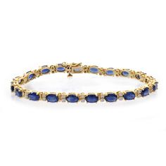 Enviable Style. This Stunning Tennis Bracelet Features Oval-Cut Sapphires (11.00 Ct. T.W.) With Color Aaa And Round-Cut Diamonds (0.40 Ct. T.W.) With I Color, I1 Clarity Set In 14k Yellow Gold. Features A Tongue Clasp For Secure Wear .The Size Of Bracelet Is 7" Inches. Sku: Wcb2013 Luxury Blue Gold Bracelet For Formal Occasions, Formal Sapphire Diamond Bracelet, Classic 14k Gold Gemstone Tennis Bracelet, Classic 14k Gold Tennis Bracelet With Gemstones, Elegant Blue Diamond Bracelet In 14k Gold, Yellow Gold Sapphire Tennis Bracelet For Formal Occasions, Yellow Gold Sapphire Tennis Bracelet For Formal, Formal Sapphire Tennis Bracelet In Yellow Gold, Elegant Yellow Gold Sapphire Tennis Bracelet