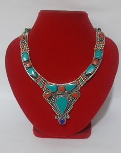 These Vintage Beautiful Necklace Are Handmade in Nepal And Contains 3 Different Gem Stone i.e. Coral, Lapis & Turquoise Which Have Their Own Unique Characteristic Feature. These Traditional Necklace Are Basically Worn By The Tibetan Community Of Nepal This necklace is a piece of jewelry that typically incorporates elements of traditional Tibetan craftsmanship and design. Traditional Turquoise Necklace With Natural Stones For Festivals, Multicolor Adjustable Traditional Turquoise Necklace, Bohemian Turquoise Necklace For Festive Occasions, Festive Turquoise Bohemian Necklace, Handmade Turquoise Traditional Necklace, Handmade Traditional Turquoise Necklace, Traditional Multicolor Turquoise Necklace As A Gift, Traditional Adjustable Turquoise Necklace, Traditional Multicolor Handmade Turquoise Necklace