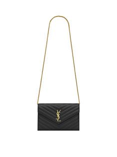 Crafted from off white chevron-quilted leather, Cassandre Chain Wallet from Saint Laurent features a gold-tone chain shoulder strap and a signature YSL logo plaque. Chic Wallet On Chain With Gold-tone Logo For Everyday, Luxury Black Wallet On Chain With Gold-tone Logo, Black Wallet On Chain With Gold-tone Logo For Evening, Black Wallet On Chain With Gold-tone Logo Plaque, Black Wallet On Chain With Gold-tone Logo, Chic Formal Wallet On Chain With Logo Plaque, Classic Evening Wallet On Chain With Logo Plaque, Formal Black Wallet On Chain With Gold-tone Logo, Elegant Evening Wallet On Chain With Logo Plaque